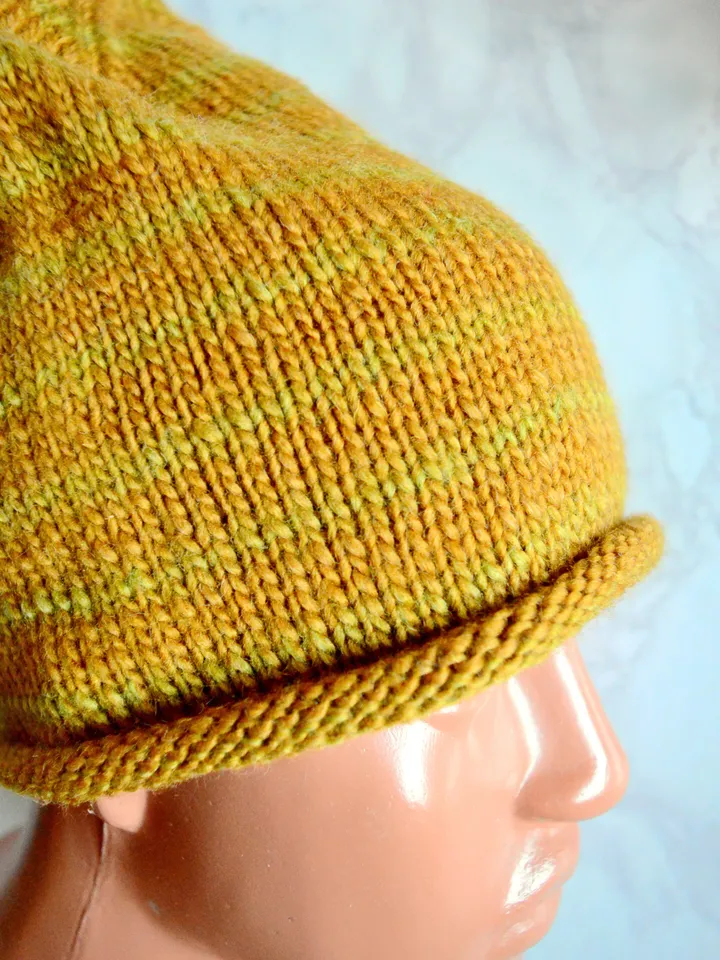 Knitted mustard colored beanie hat for women