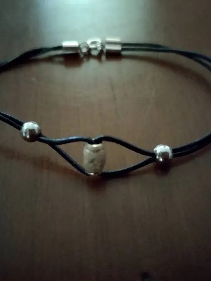 Bracelet in silver and leather.