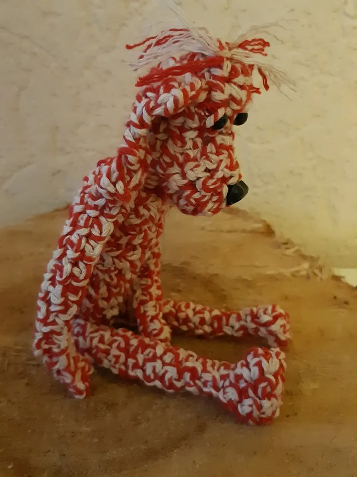 Fantasy crochet doggy, glass eyelets, plastic cream, melee