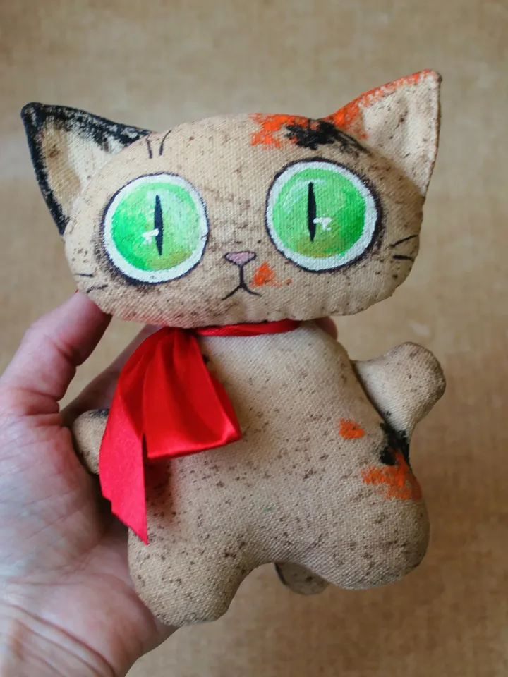 Star - coffee cat - a symbol of the new year in a gift box