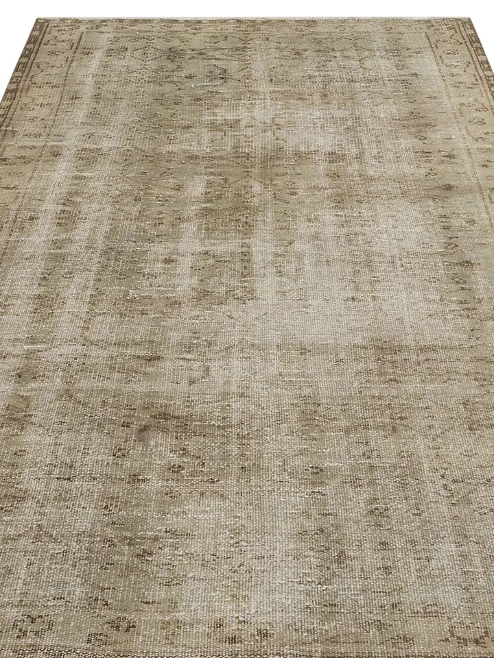 Add a touch of tradition and elegance to your home with our Natural Turkish Rug