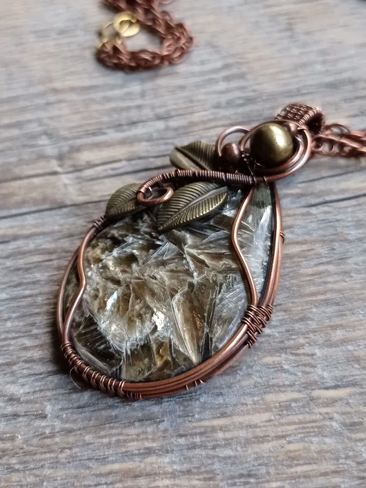 A catchy fancy pendant with a rare stone, an anniversary gift, a gift to yourself. Pendant for a dresses occasions
