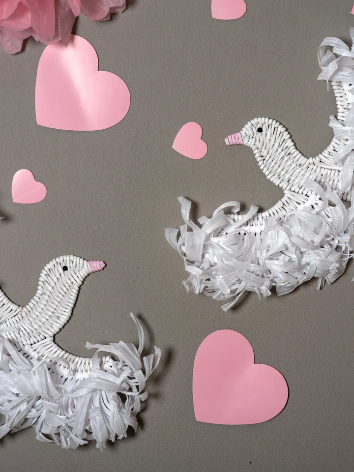 Two white doves handmade. Hanging birds with white raffia for wall decor.