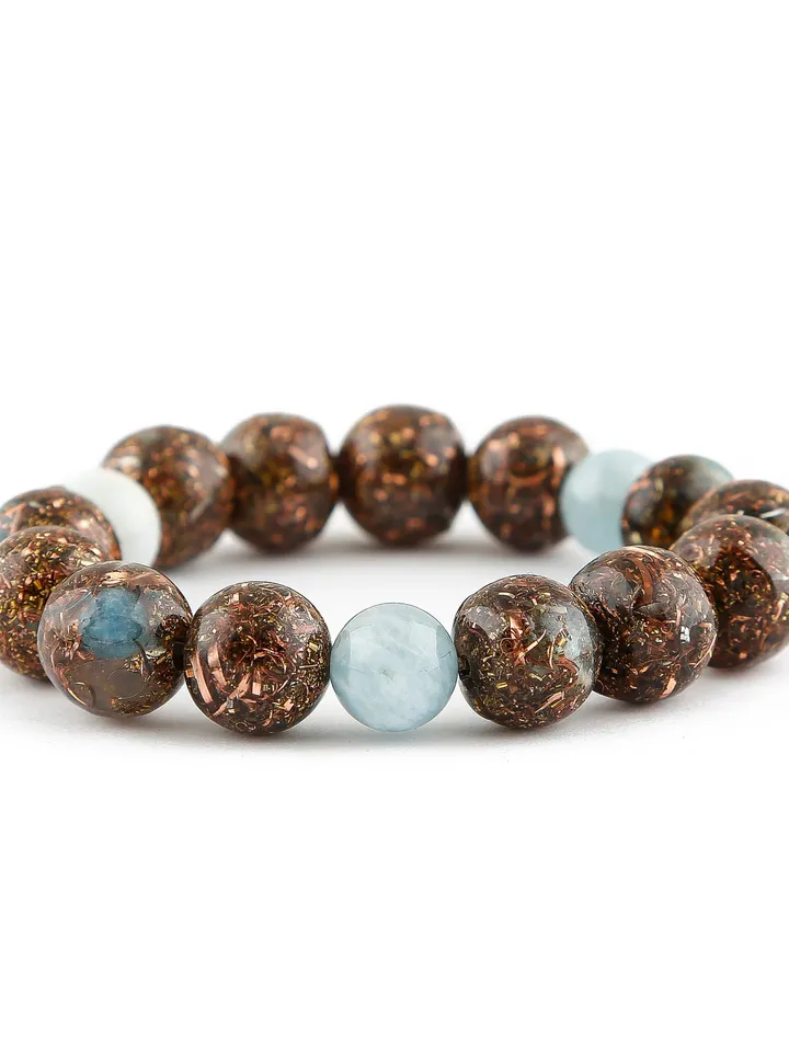 Orgonite aquamarine, serenity, throat chakra bracelet. The power of aquamarine is increased with incense and Tibetan bowls.
