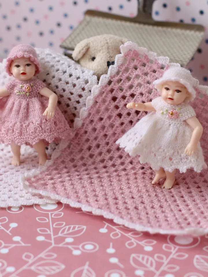 Miniature hand knitted dress for 2 inch baby doll Heidi Ott
