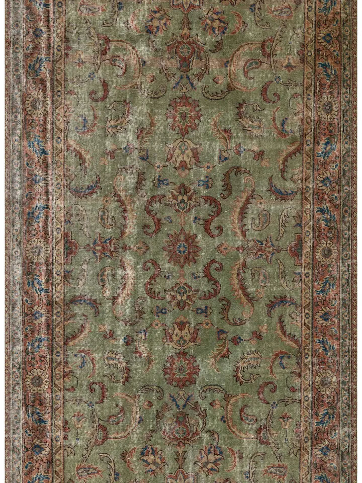 Elevate your decor with a unique 5x8 ft vintage green Turkish rug - handwoven to perfection for a touch of timeless elegance!