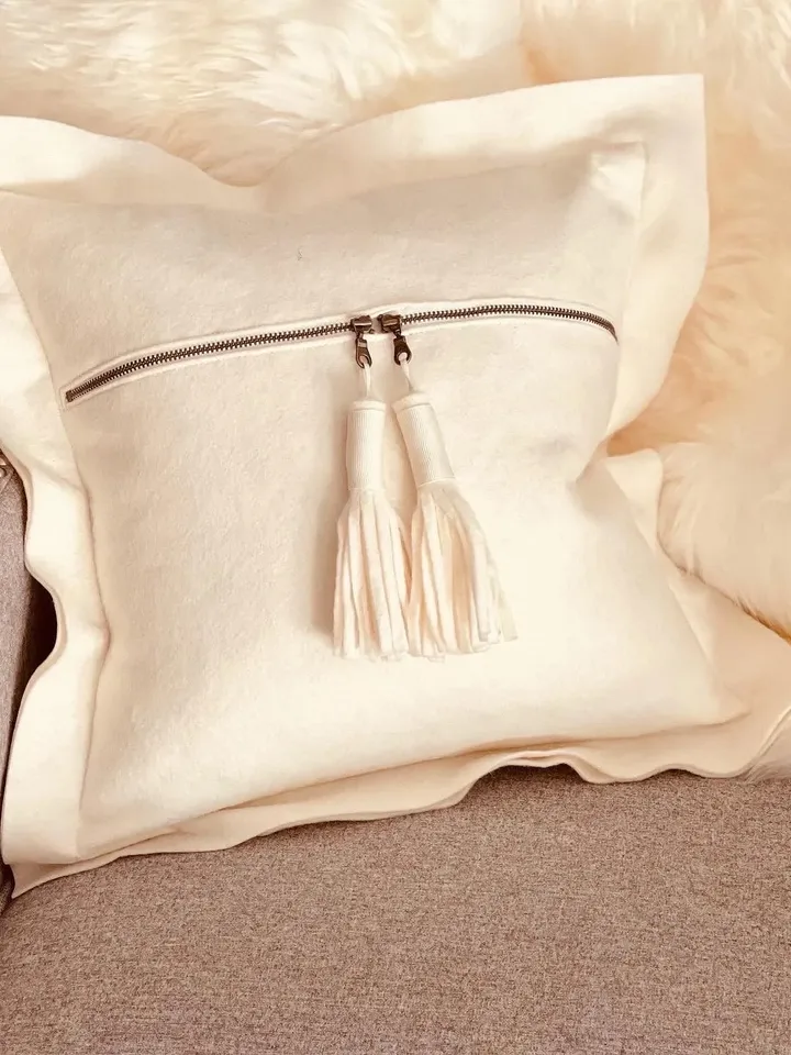 White wool tassel pillow