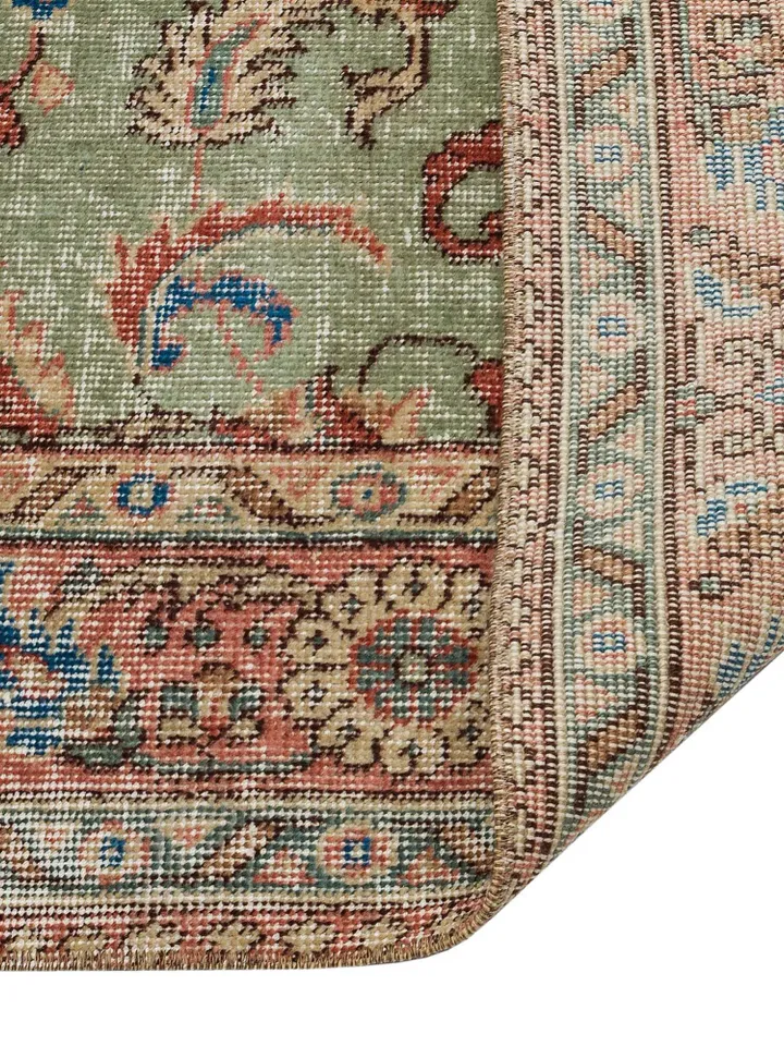 Elevate your decor with a unique 5x8 ft vintage green Turkish rug - handwoven to perfection for a touch of timeless elegance!