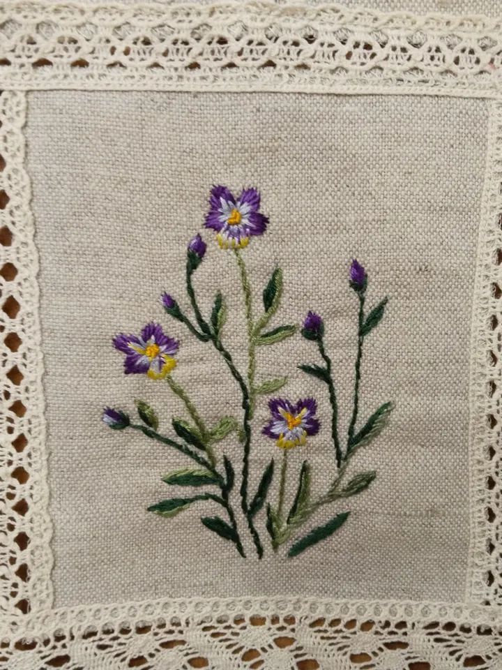 Beautiful table napkin or wall hanging with embroidery flowering herbs, pure, raw, thick, linen. Hand embroidery.