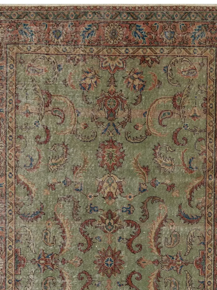 Elevate your decor with a unique 5x8 ft vintage green Turkish rug - handwoven to perfection for a touch of timeless elegance!