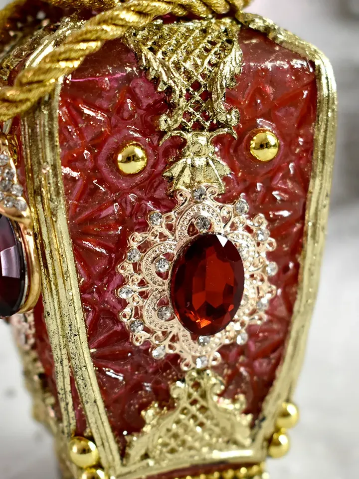 Red glass bottle for perfumes or aromatic oils dressing table decoration