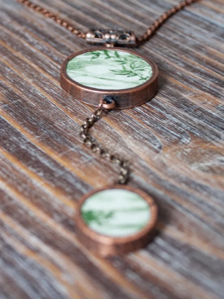 Unique handmade porcelain pendant in a copper frame made using the electroforming process