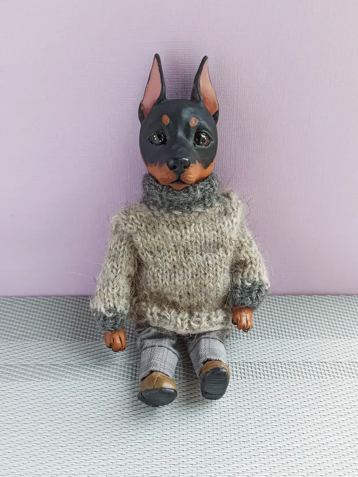 a doberman pinscher doll