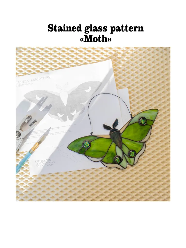 Digital stained glass moth pattern