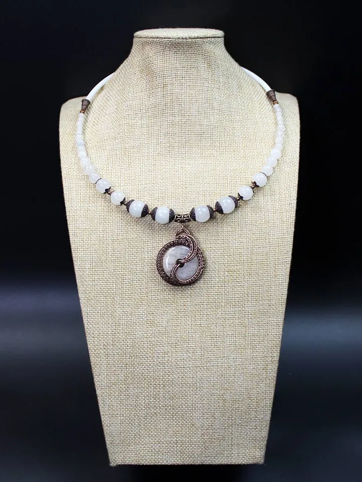 Copper Wire Wrapped Stone Donut Pendant Necklace.