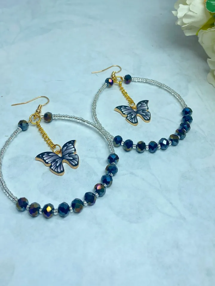 Earrings with butterflies. Handmade jewelry. Individual design.