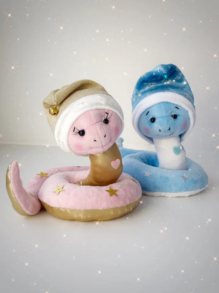 Christmas plush snakes. Handmade cute snakes in holiday hat for home decor. Christmas snakes for gift.