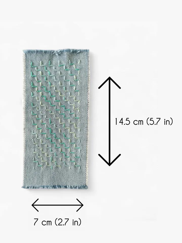 Sashiko patch hand sewn from recycled denim.