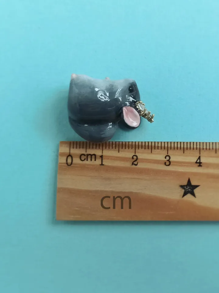 a tiny chinchilla figurine on the blue flower base with nameplate (US discount)