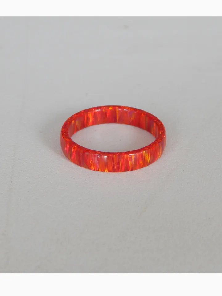 Very beautiful ring of opal. Solid opal band. Solid opal ring. Synthetic opal ring.