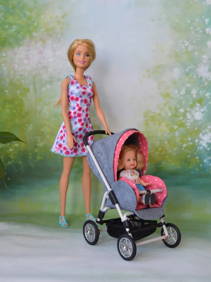 Miniature toy stroller for dolls in 1/6 scale. Accessories for small dolls and poupins. Pram for Barbie doll.