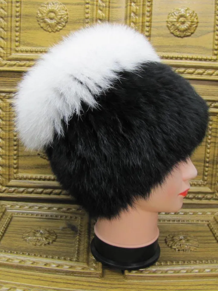 Women's fur hat made of natural rabbit fur. Rabbit hat with arctic fox. Women's winter hat, fur accessory. Rabbit and arctic fox fur.