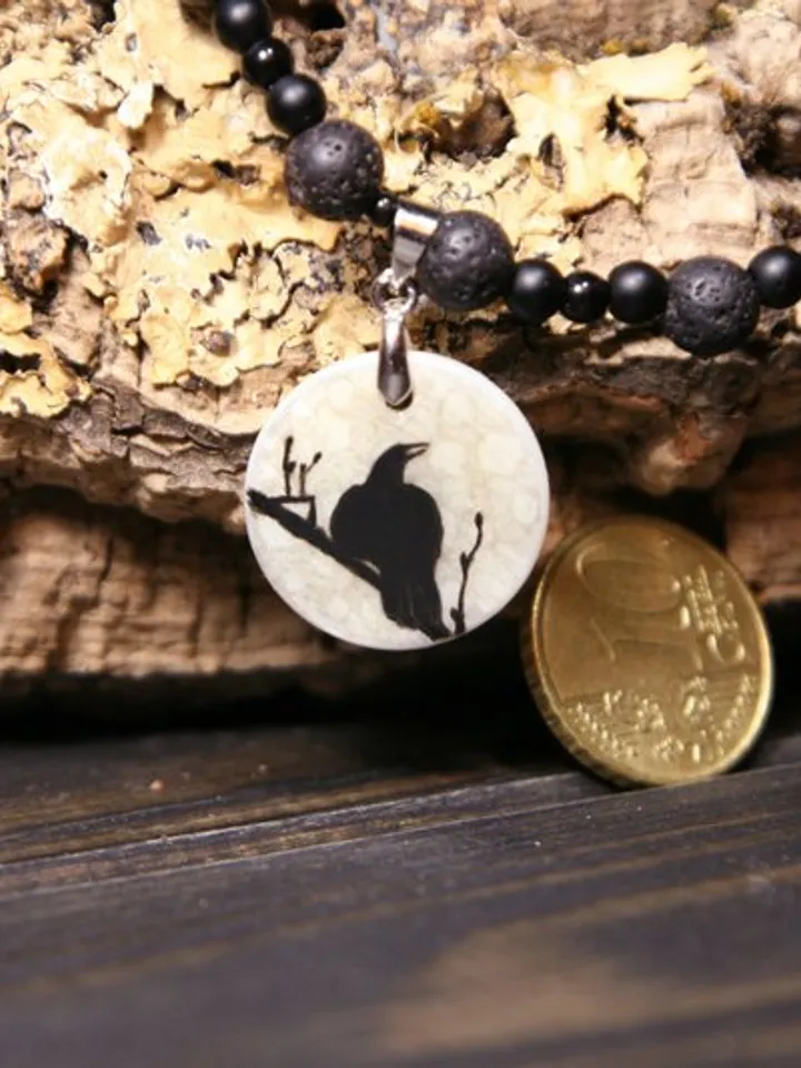 Raven or crow necklace with love rune on the other side. Nacre pearl pendant