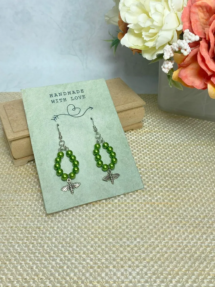 Earrings with green flies. Handmade jewelry.