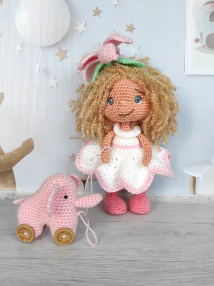 small doll in a white dress, flower girl doll