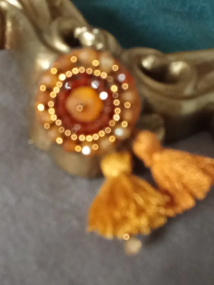 Garnet embroidered ring "Solaris"