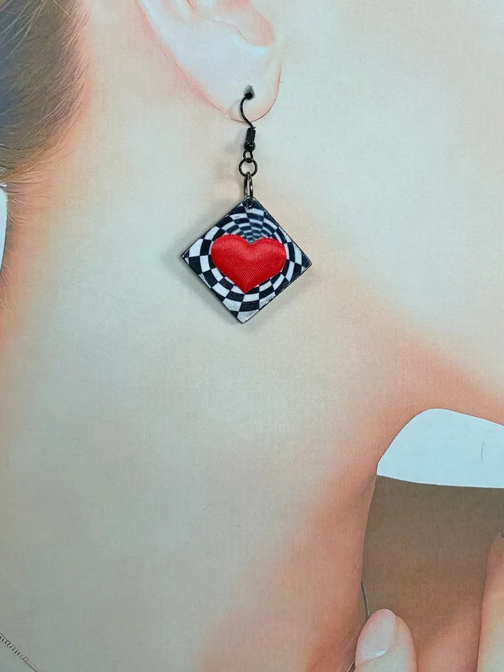 Bright handmade earrings. Handmade jewelry. Author's design. Earrings with bright hearts.