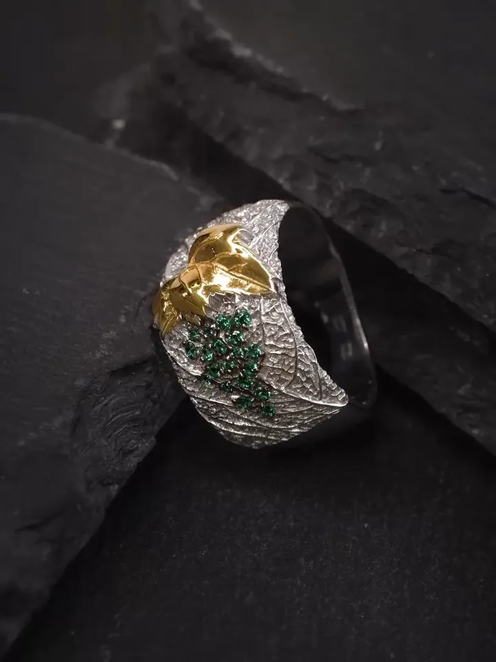 Women's silver ring with gilding and with green stones of nanizumruda 925 sample
