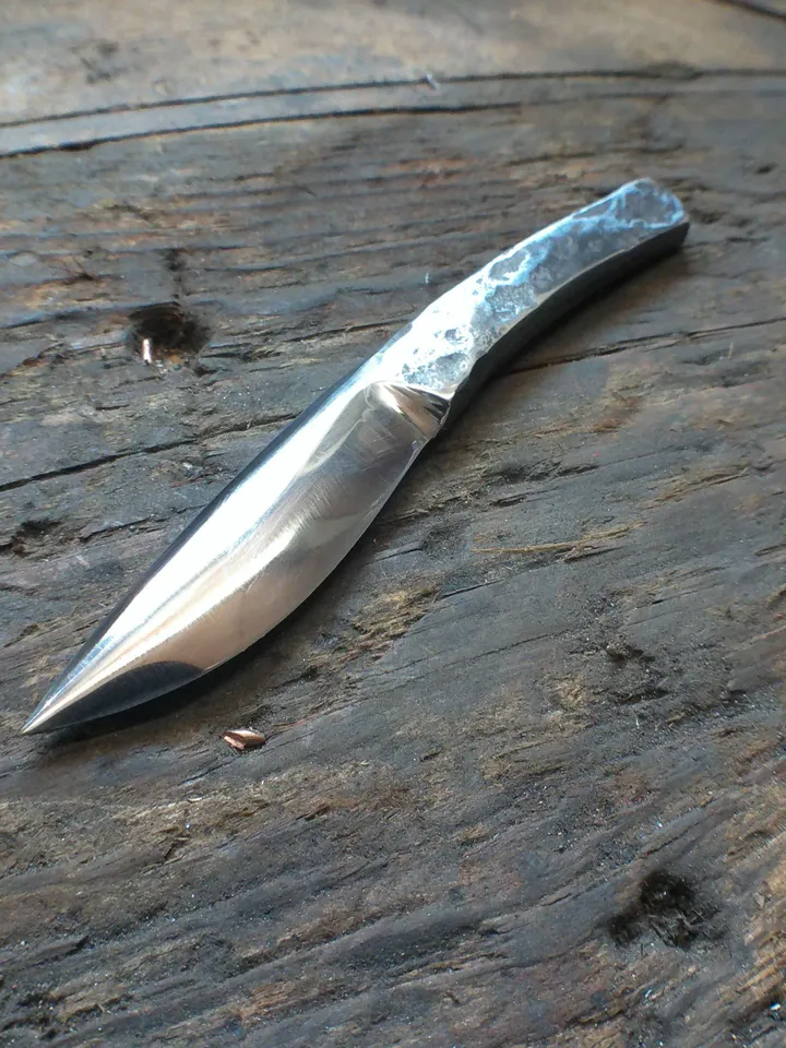 A Black & White, Raw knife without handle of French craftsmanship forged in the old way, Original, Unique, Artistic Brut forge, by hand