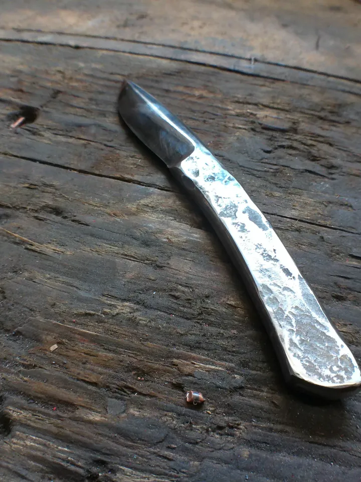 A Black & White, Raw knife without handle of French craftsmanship forged in the old way, Original, Unique, Artistic Brut forge, by hand