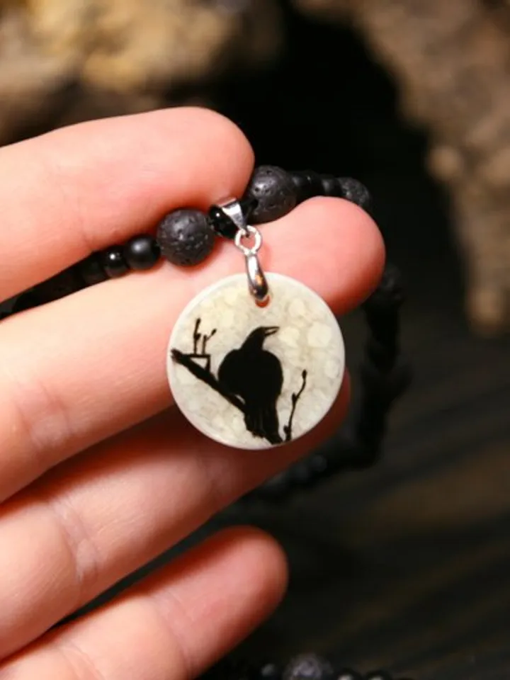 Raven or crow necklace with love rune on the other side. Nacre pearl pendant