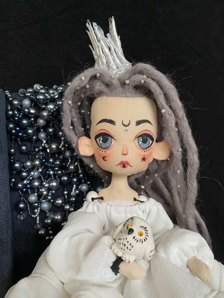 White Queen doll with dreadlocks and tattoos