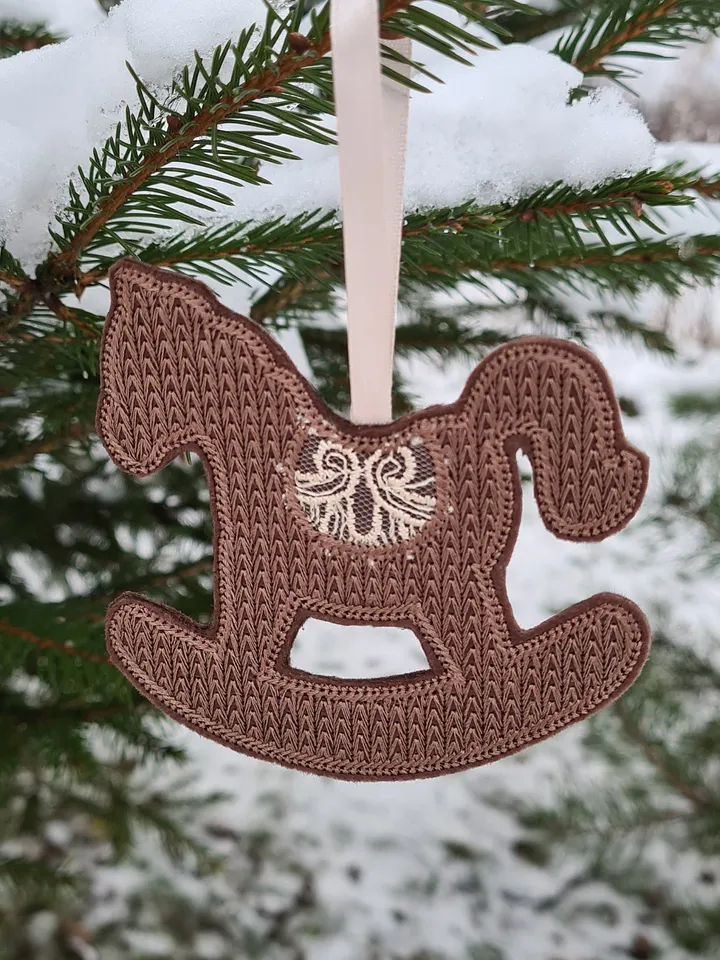 New Year's set of designs of six Christmas tree decorations and a gift box.