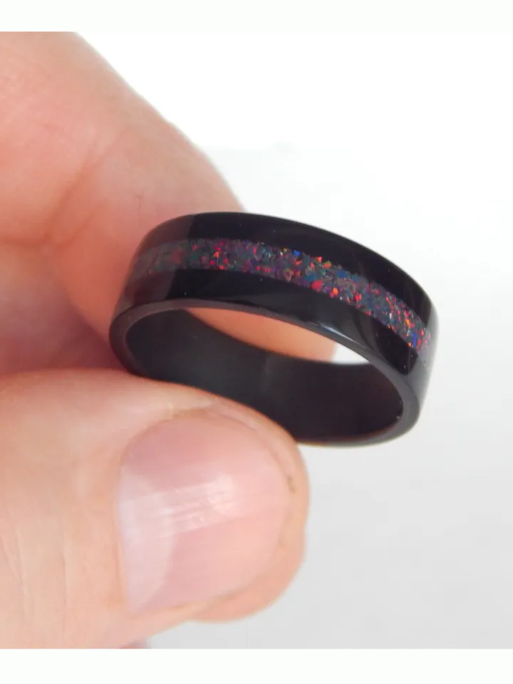 Stylish black ring. Carbon ring with synthetic opal. 10 1/2