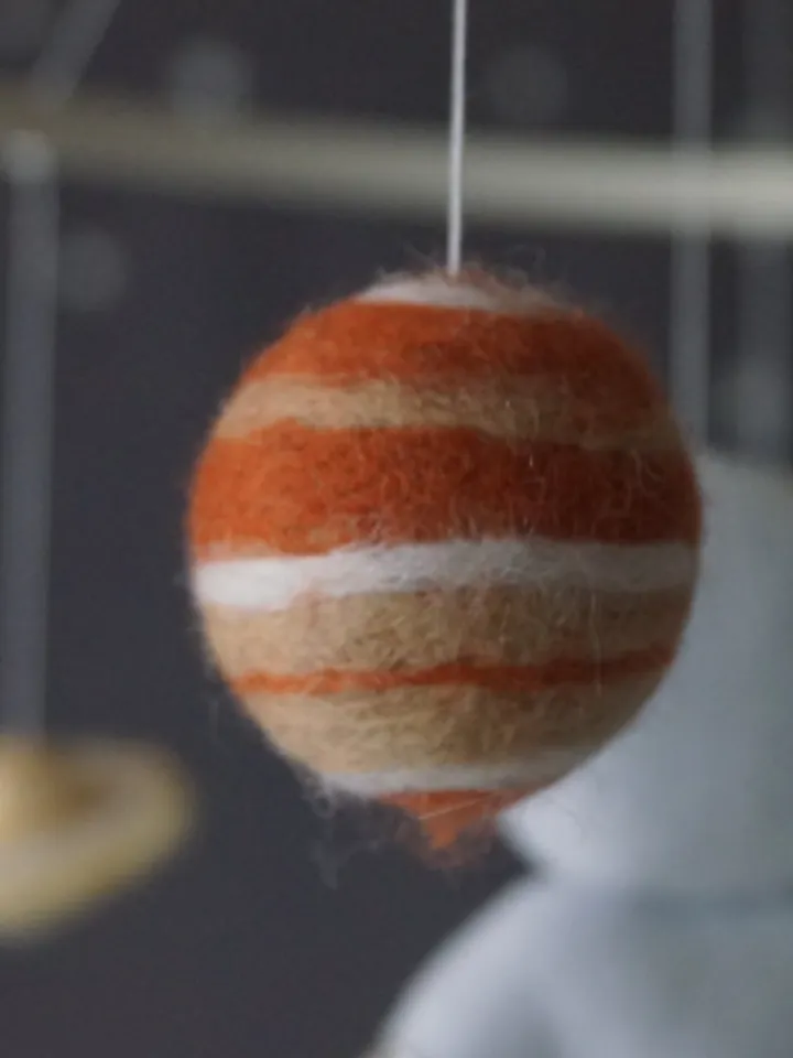 A space mobile for astronaut's nursery, a Shuttle and a rocket made of felt for the decor boy's room