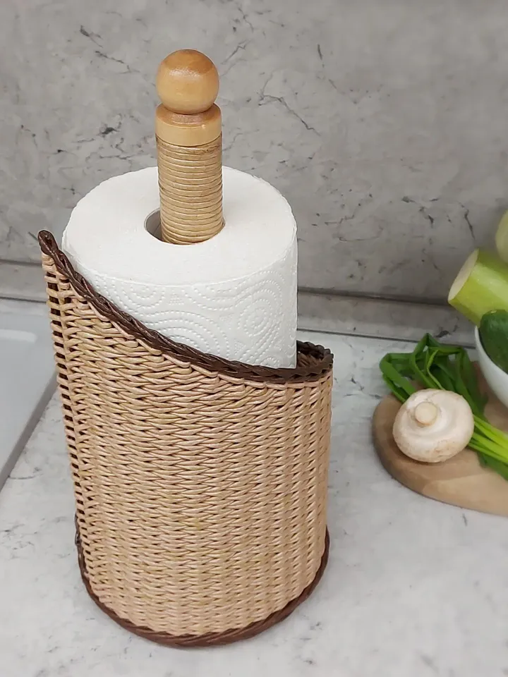Rustic paper towel holder with wooden tip. Storage and decor on the countertop