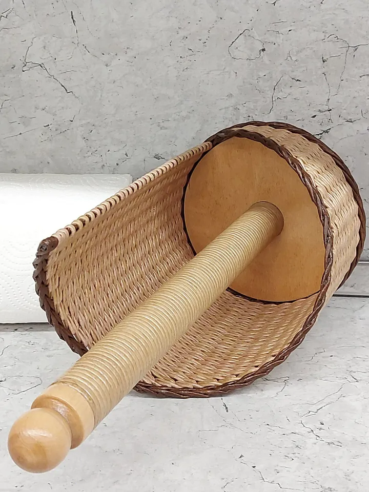 Rustic paper towel holder with wooden tip. Storage and decor on the countertop