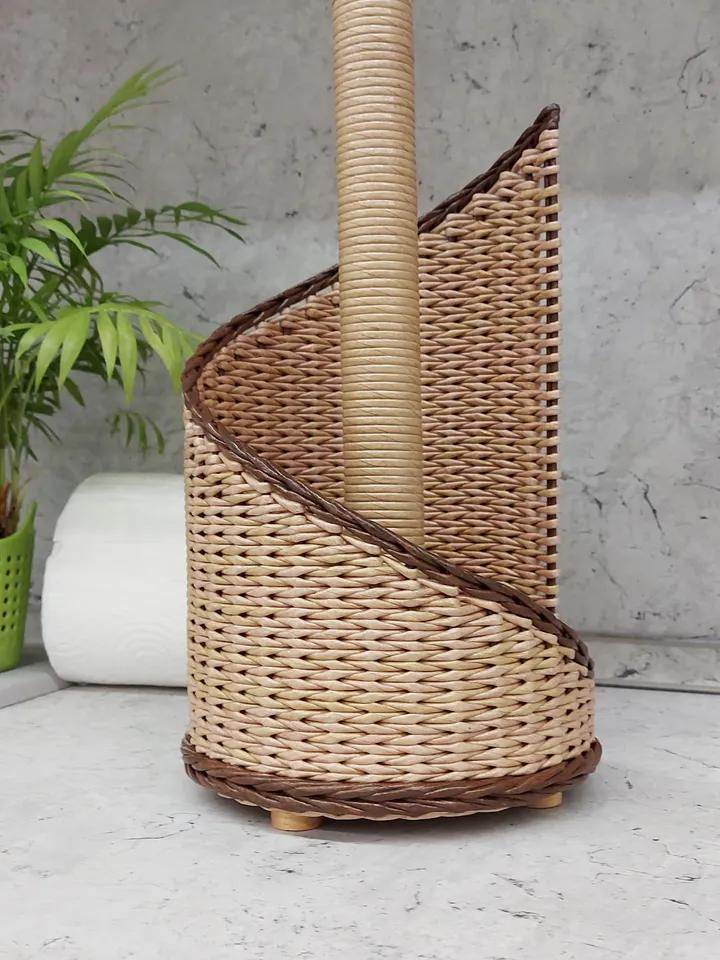 Rustic paper towel holder with wooden tip. Storage and decor on the countertop