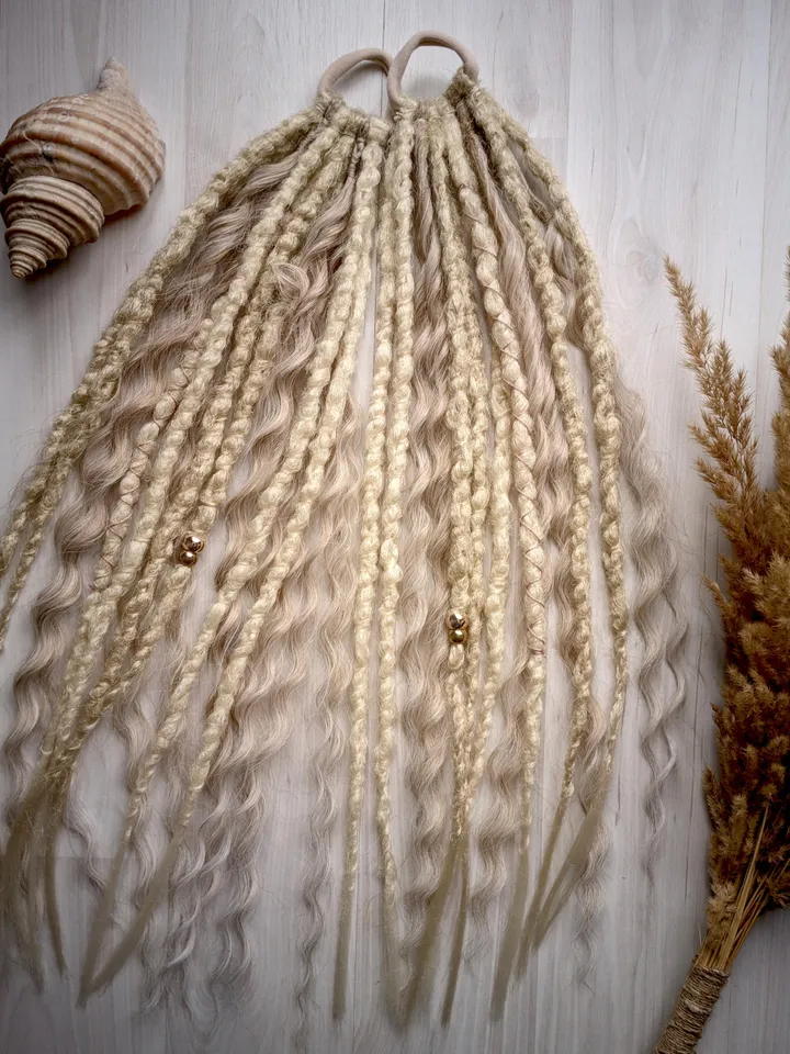 Blonde Dreads with Loose Waves on Elastic Hair Ties Featuring Curly Accents and Gold Beads for Boho Beach or Festival Styles