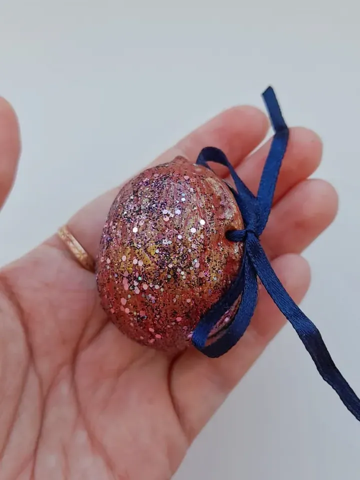 Miniature crochet elephant in a nut house