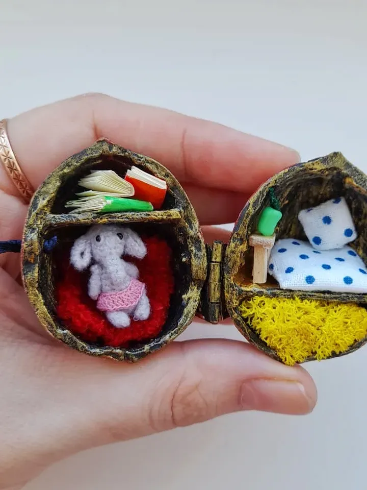 Miniature crochet elephant in a nut house