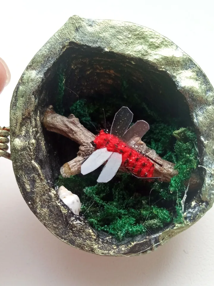 Miniature terrarium with crochet chameleon toy