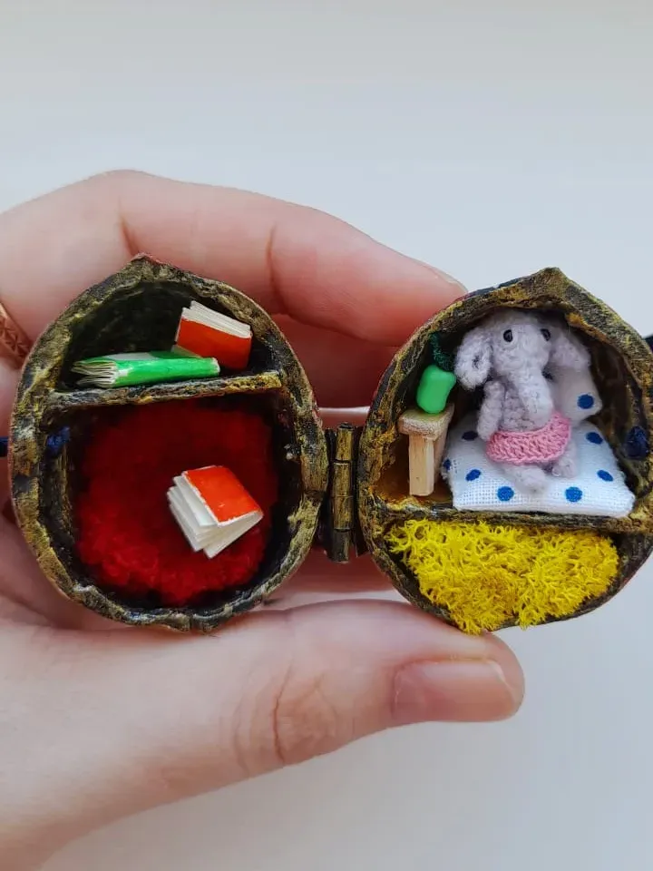 Miniature crochet elephant in a nut house