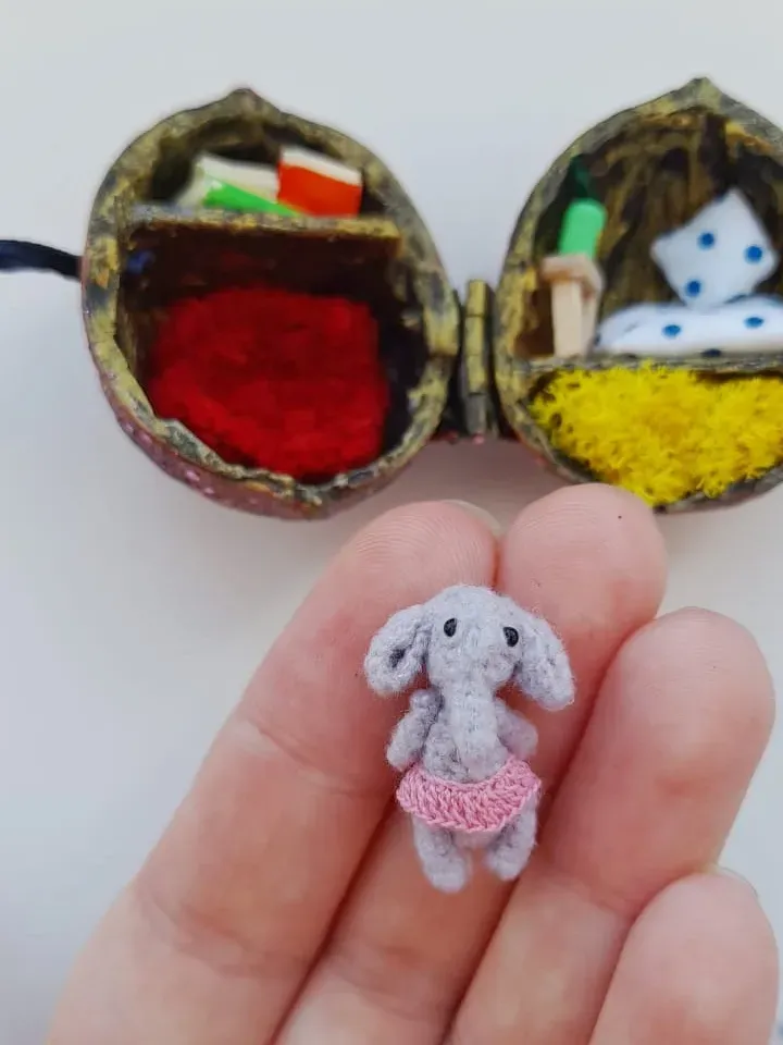 Miniature crochet elephant in a nut house
