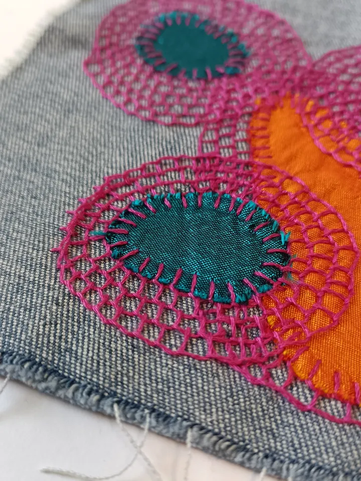 Upcycled denim boro patch. Sashiko stitching.