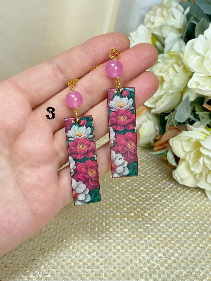 Earrings with luminous beads. Handmade jewelry.